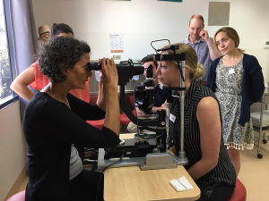 Dr Anne Malatt - Eye Surgeon demonstrating the use of a slit lamp